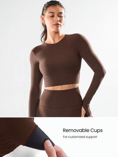 GLOWMODE قميص رياضي طويل الأكمام مقصوص بتصميم متقاطع بدون ظهر FeatherFit™ للتأثير المنخفض، مناسب لليوغا واستخدام اليومي