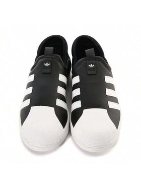 Adidas أحذية كاجوال سهلة الارتداء من القماش يونيسكس IG5717