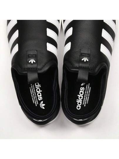 Adidas أحذية كاجوال سهلة الارتداء من القماش يونيسكس IG5717