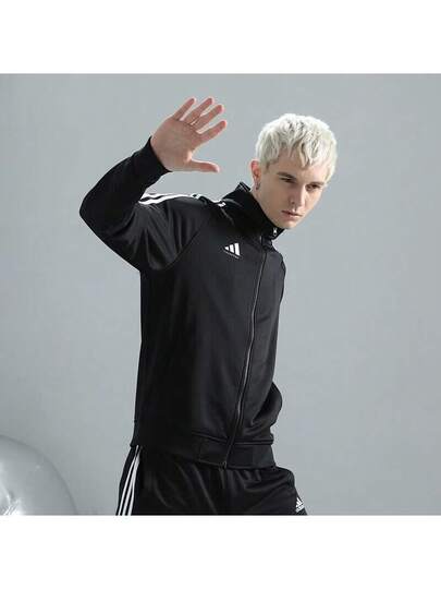 Adidas جاكيت رياضية مزينة برسومات حرفية وشريط جانبي مع سحاب