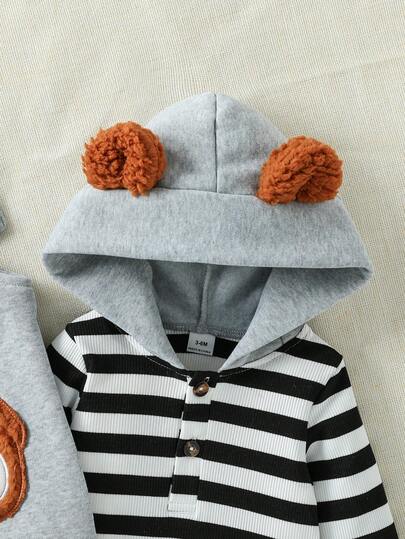 SHEIN Playful Pals طقم ملابس مكون من 2 قطعة للأطفال الرضع والصغار، ملابس علوية بغطاء رأس مخطط بأذنين ناعمة وسروال مطرز بدب، شارة دب كبيرة، ملابس خريفية/شتوية، مناسب للجنسين من حديثي الولادة إلى عمر سنتين