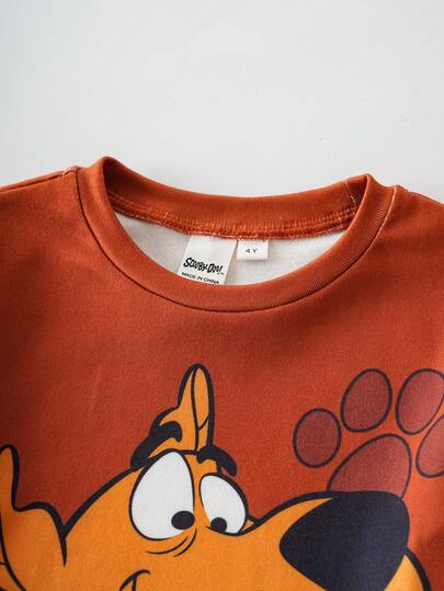 SCOOBY-DOO X SHEIN مجموعة بيجاما كاجوال مرنة تتكون من ملابس علوية كم طويل بطبعة كرتونية لصبي وسروال ضيق، 2 قطعة