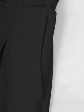 جمبسوت نسائية مطوية مع جيوب باللون الأسود للربيع