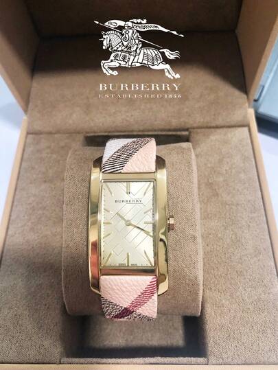Burberry ساعة هاي ماركت بسوار جلدي بيج ومينا بلون الشمبانيا للنساء