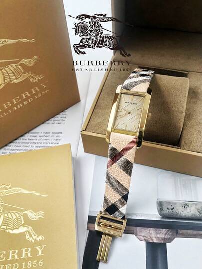Burberry ساعة هاي ماركت بسوار جلدي بيج ومينا بلون الشمبانيا للنساء