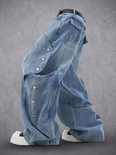 Manfinity Denimwave بنطلون جينز كاجوال فضفاض مهترئ مع تصميم رقعة جرافيكي للرجال