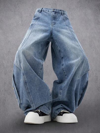 Manfinity Denimwave بنطلون جينز كاجوال فضفاض مهترئ مع تصميم رقعة جرافيكي للرجال