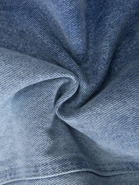 Manfinity Denimwave بنطلون جينز كاجوال فضفاض مهترئ مع تصميم رقعة جرافيكي للرجال