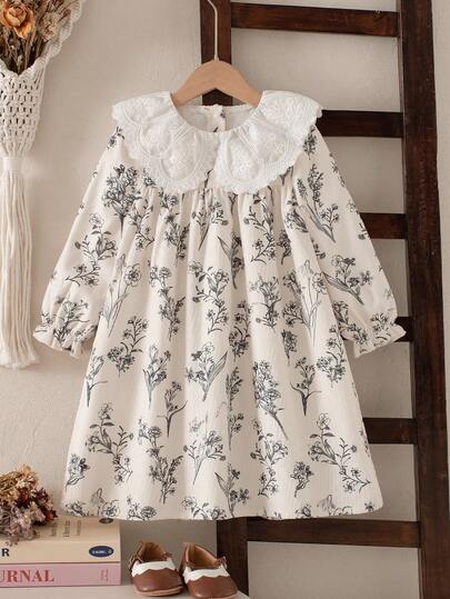 SHEIN Genkimix Kids فستان بأكمام طويلة بتصميم فضفاض مع طبعة زهور صغيرة للفتيات، أساور مطاطية، زهرة على الياقة، تصميم فتحة أمامية، طازج وأنيق للمدرسة والتنقل، متعدد الاستخدامات، للخريف