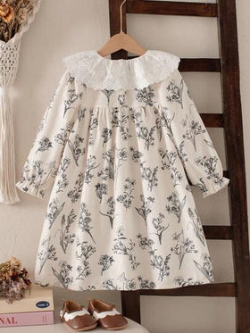 SHEIN Genkimix Kids فستان بأكمام طويلة بتصميم فضفاض مع طبعة زهور صغيرة للفتيات، أساور مطاطية، زهرة على الياقة، تصميم فتحة أمامية، طازج وأنيق للمدرسة والتنقل، متعدد الاستخدامات، للخريف