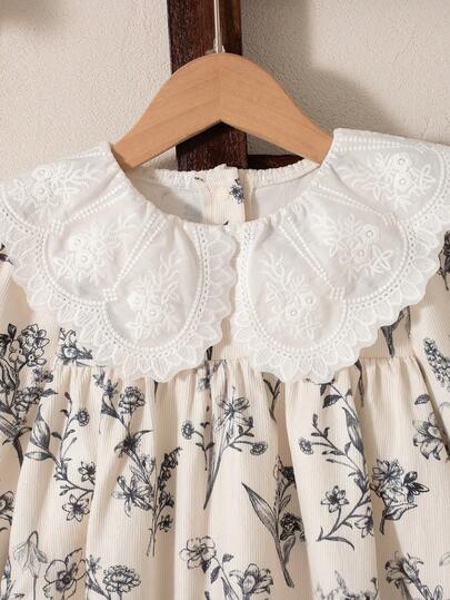 SHEIN Genkimix Kids فستان بأكمام طويلة بتصميم فضفاض مع طبعة زهور صغيرة للفتيات، أساور مطاطية، زهرة على الياقة، تصميم فتحة أمامية، طازج وأنيق للمدرسة والتنقل، متعدد الاستخدامات، للخريف