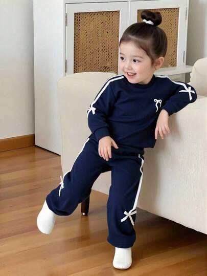 Elladie kids مجموعة بدلة رياضية كاجوال للفتيات من عمر 4-7 سنوات، تتكون من بلوزة وبنطلون بتصميم فيونكة باللون البنفسجي، مناسبة للخريف