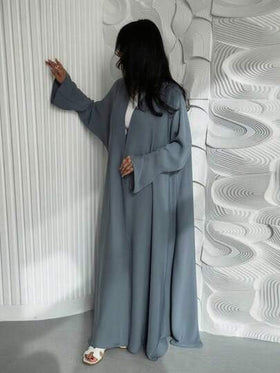 عباءة سادة من القماش الساتان ذات تصميم أنيق وطويل للنساء المحتشمات