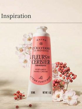 L'Occitane كريم اليد المعطر بحجم السفر بعبير أزهار الكرز المذهلة 10مل/0.34أونصة