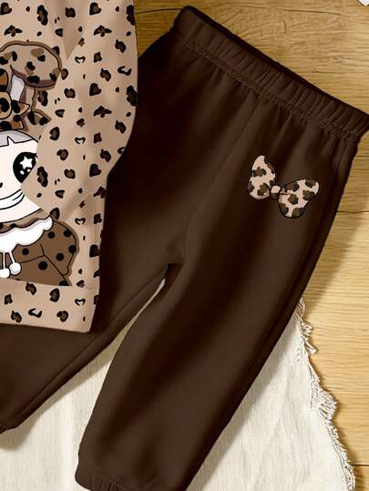 SHEIN Playful Pals مجموعة من قطعتين للفتيات الصغيرات، تتكون من هوديي وبنطلون رياضي، بتصميم عصري وجذاب مزين برسومات الفهد والأرنب، قطع ملابس مريحة ودافئة