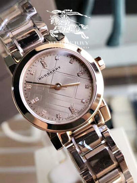 Burberry ساعة نسائية من الفولاذ المقاوم للصدأ بمينا ذهبي وردي