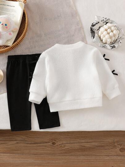 SHEIN طقم جاكيت محبوكة بفيونكة وبنطلون أحادي اللون للأطفال حديثي الولادة للموسم الانتقالي بين الخريف والشتاء