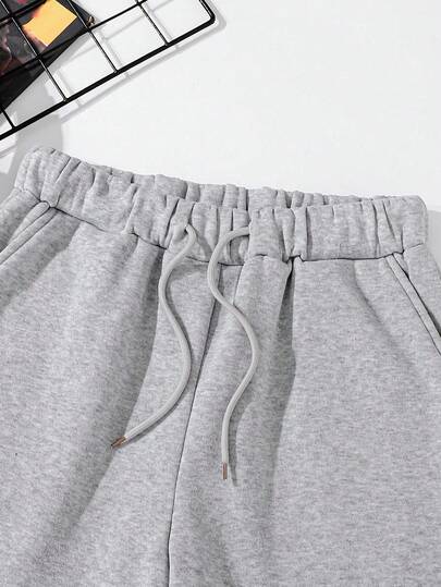 SHEIN Mirajuku بنطلون رياضي مطبوع بتصميم جرافيك فضفاض مناسب للمراهقين الذكور، مناسب للاستخدام اليومي والتنقل والرياضة