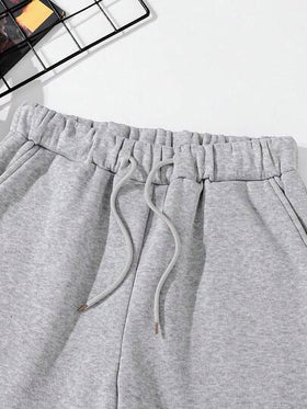 SHEIN Mirajuku بنطلون رياضي مطبوع بتصميم جرافيك فضفاض مناسب للمراهقين الذكور، مناسب للاستخدام اليومي والتنقل والرياضة