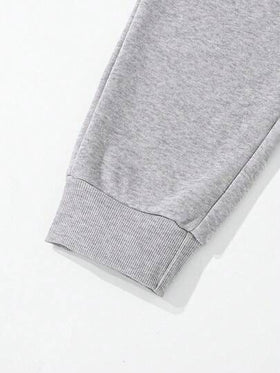 SHEIN Mirajuku بنطلون رياضي مطبوع بتصميم جرافيك فضفاض مناسب للمراهقين الذكور، مناسب للاستخدام اليومي والتنقل والرياضة