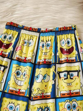 SpongeBob SquarePants | SHEIN بيجامة مكونة من ملابس علوية كم طويل بياقة طاقم وأنماط كرتونية متعددة التعبيرات مع بنطلون فضفاض مقاوم للاشتعال، مناسبة للخريف والشتاء