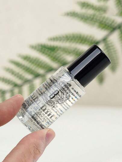Bobbi Brown زيت تنظيف مهدئ [ميني] من بوبي براون 15مل / منظف زيتي لإزالة المكياج اللطيف / منظف وجه زيتي خفيف كالماء يزيل الشوائب والمكياج المقاوم للماء مع تغذية البشرة.