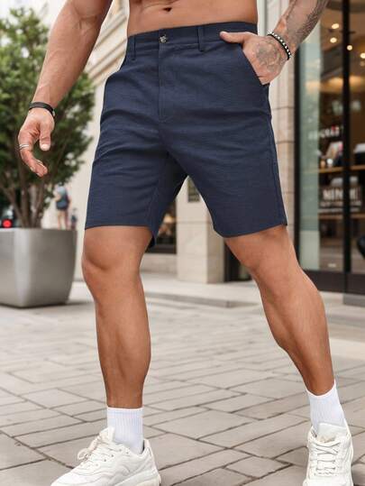 Manfinity Homme شورت رجالي أزرق داكن بتصميم بسيط وجيب، قصير وضيق للصيف