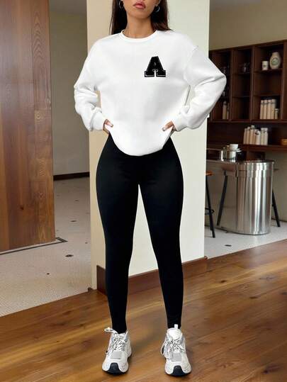 SHEIN EZwear مجموعة بلوزة رياضة وسروال ضيق للنساء في فصل الشتاء