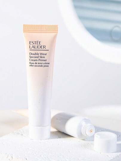 Estée Lauder إستي لودر بريمر ميني دبل وير 15مل / ملمس ناعم كالحرير / يقلل من التجاعيد والمسام والعيوب / هذا البوليمر الجديد الناعم يشكل طبقة شفافة مرنة لتحسين نعومة البشرة والتجانس [تغليف عشوائي (نمطان)]