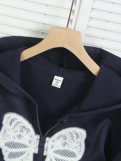 SHEIN جاكيت سويت شيرت بقصة فراشة للمراهقات، بتصميم أكمام أنيق وقماش فليس مريح، بأسلوب شبابي وحيوي، مناسب لموسم العودة للمدرسة أو الارتداء اليومي