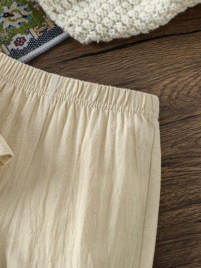 SHEIN رمضان مجموعة قميص أكمام قصيرة طوق ماندرين وبنطلون مطابق للأطفال الرضع الجنسين، لون بيج