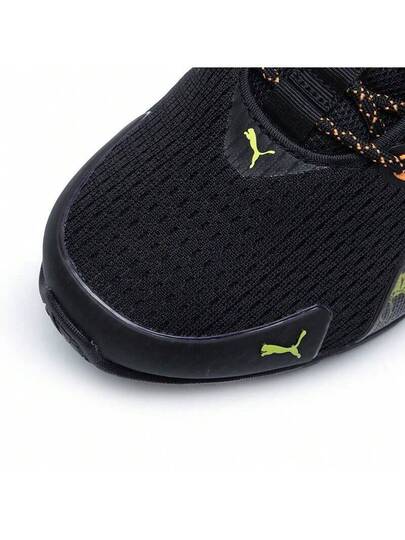 Puma أحذية بوما فولتايك إيفو الرياضية الكاجوال المريحة والمنفذة للهواء، مصنوعة من قماش وجلد اصطناعي، قصيرة الكاحل، مناسبة للجنسين، باللونين الأسود والبرتقالي