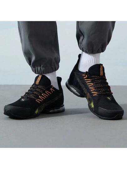 Puma أحذية بوما فولتايك إيفو الرياضية الكاجوال المريحة والمنفذة للهواء، مصنوعة من قماش وجلد اصطناعي، قصيرة الكاحل، مناسبة للجنسين، باللونين الأسود والبرتقالي