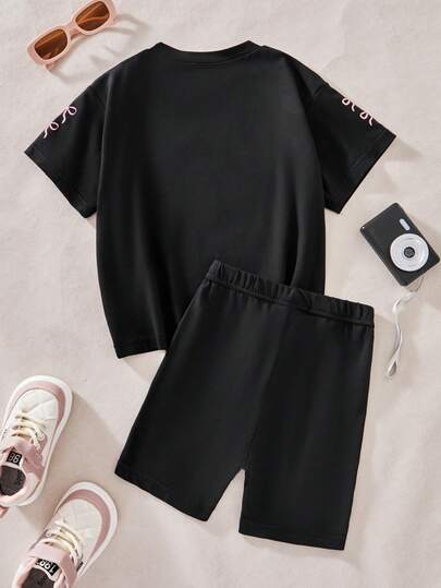 SHEIN مجموعة بنطلون قصير وتيشيرت بأكمام قصيرة للأطفال الصغار، طباعة رقم 67 بتصميم بسيط وجميل، باللون الأسود، 2 قطعة