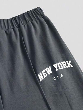 SHEIN Girlism مجموعة قطعتين من ملابس علوية بأكمام راجلان فضفاضة مطبوع عليها حرف نيويورك وشورت مطوي للفتيات المراهقات، ملابس كاجوال يومية، مناسبة للعودة إلى المدرسة، والعطلات العائلية والنزهات الربيعية، وارتداء اليومي في مناسبات متنوعة