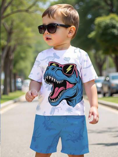 SHEIN GraphicGems طقم قصير الأكمام بطبعة ديناصور كرتونية مضحكة وشورت مناسب للأولاد الصغار، مناسب للخارج والرياضة والمدرسة في الربيع والصيف، طقم بطبعة ديناصور أزرق