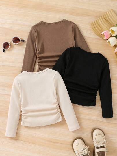 SHEIN قمصان داخلية محبوكة بأكمام طويلة ذات لون أساسي مريح للفتيات الصغيرات، مناسبة للارتداء اليومي والمدرسي في فصلي الخريف والشتاء، ضرورية وعملية، متناسقة مع الأم والابنة، قمصان بشكل قلب للفتيات. قمصان بأكمام طويلة للفتيات، مناسبة لعيد الميلاد.