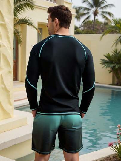 Manfinity Swimmode مجموعة بدلة سباحة للرجال مكونة من قطعتين (ملابس علوية وشورت) بتصميم لوني متباين