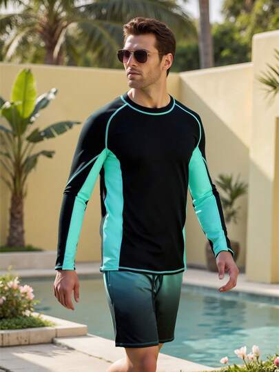 Manfinity Swimmode مجموعة بدلة سباحة للرجال مكونة من قطعتين (ملابس علوية وشورت) بتصميم لوني متباين