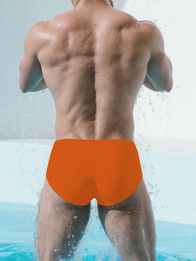 Manfinity Swimmode سروال السباحة اليومي الأحادي اللون البسيط للرجال
