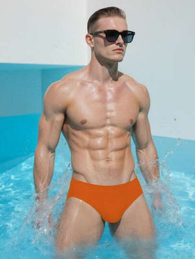 Manfinity Swimmode سروال السباحة اليومي الأحادي اللون البسيط للرجال