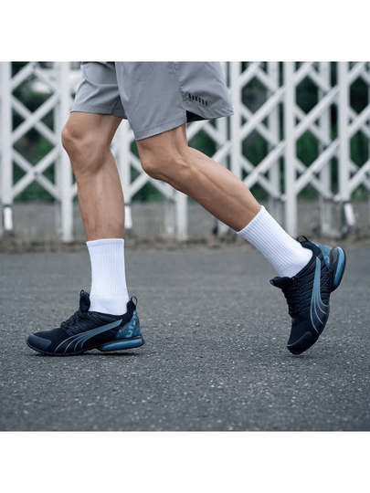 Puma أحذية رياضية كاجوال منخفضة الكاحل مريحة من بوما فولتايك إيفو للرجال، باللون الأسود والأزرق