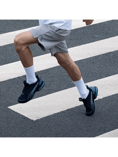 Puma أحذية رياضية كاجوال منخفضة الكاحل مريحة من بوما فولتايك إيفو للرجال، باللون الأسود والأزرق