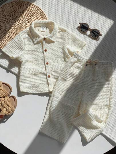 SHEIN مجموعة من قطعتين للأطفال الرضع والأولاد الصغار، ملابس علوية أبيض مفرغ مريح قصير الأكمام وبنطال واسع الساق، كاجوال تقليدي متنوع مناسب للربيع والصيف والخريف والمناسبات والاحتفالات والعطلات والأعياد والأعراس وحفلات استقبال المواليد وعيد الميلاد الأول