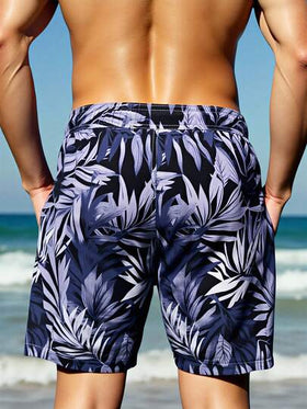 Manfinity Swimmode شورت كاجوال بخصر رباط وجيوب بطبعة نباتات استوائية للرجال