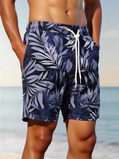 Manfinity Swimmode شورت كاجوال بخصر رباط وجيوب بطبعة نباتات استوائية للرجال