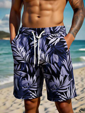 Manfinity Swimmode شورت كاجوال بخصر رباط وجيوب بطبعة نباتات استوائية للرجال