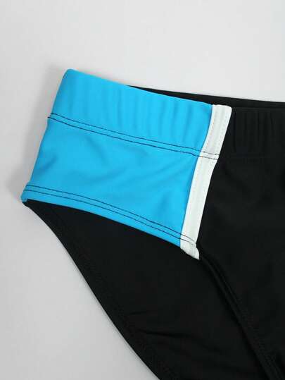 Manfinity Swimmode سراويل سباحة مطاطية الخصر بألوان متباينة للرجال