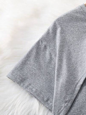 SHEIN Sparklyn طقم ملابس كاجوال يومي مكون من قميص كامي بطبعة قلب بياقة دائرية وذيل غير منتظم وأكمام قصيرة، وبنطال بخصر مطاطي وساق واسعة