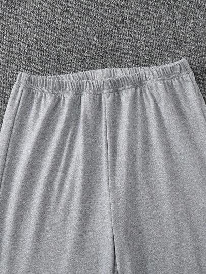SHEIN Sparklyn طقم ملابس كاجوال يومي مكون من قميص كامي بطبعة قلب بياقة دائرية وذيل غير منتظم وأكمام قصيرة، وبنطال بخصر مطاطي وساق واسعة